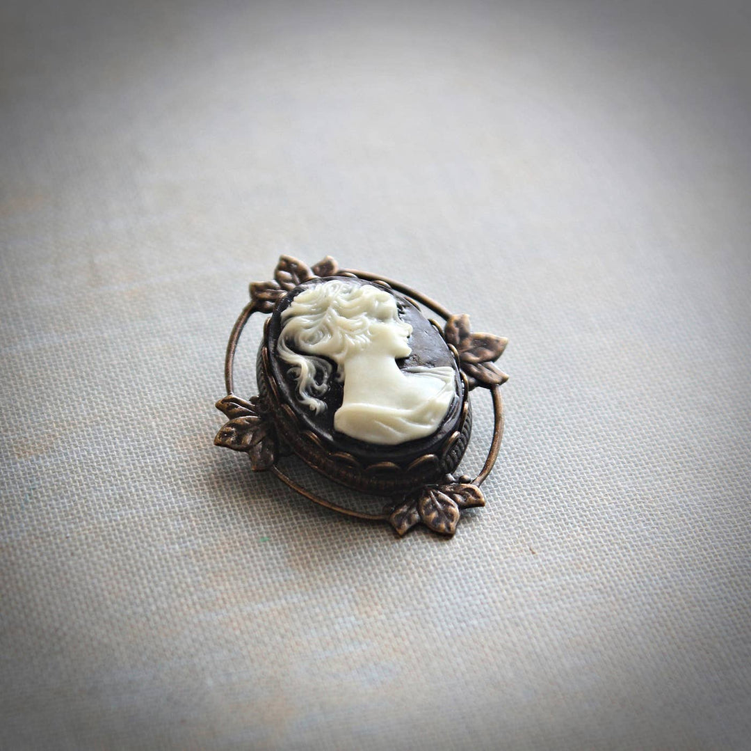 Circa 1890 - Petite Black and Ivory Cameo Brooch Pendant
